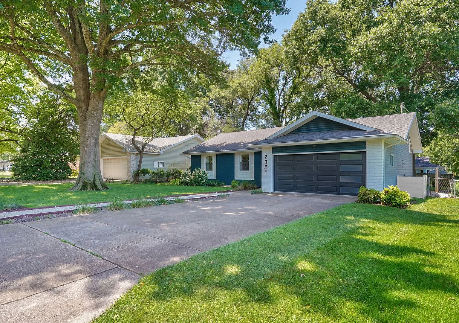 Beautifully Updated 3 Bedroom, 2 Bathroom Home with ScreenedIn Porch & Large Fenced Yard — Photo 2