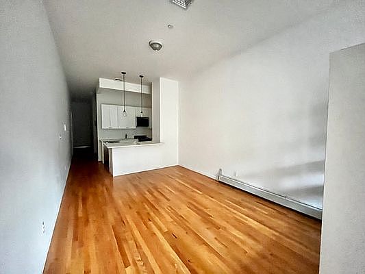 4th image of 611 Grand St APT 1A