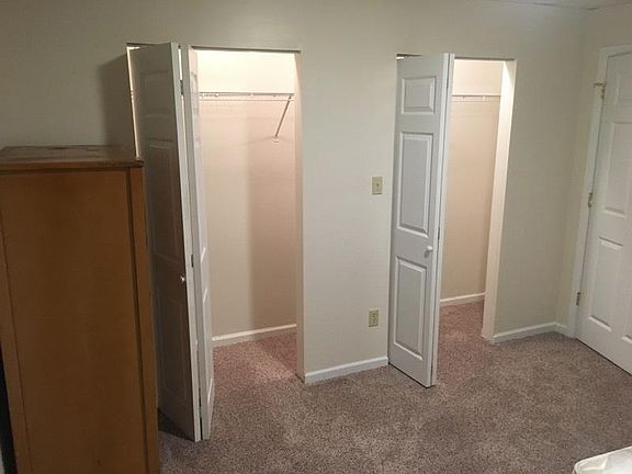 Walk in closet in bedroom