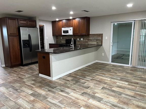 kitchen/sliders to the enclosed porch