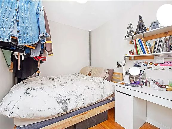 2nd image of 412 E 11th St APT 3R