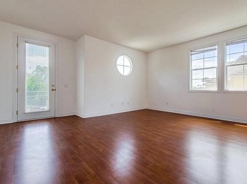 Living Area with door to Balcony