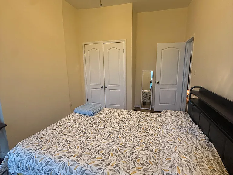 Bedroom 2 view from inside, a double-door closet for storage, and space for a dresser or desk. dresser available.