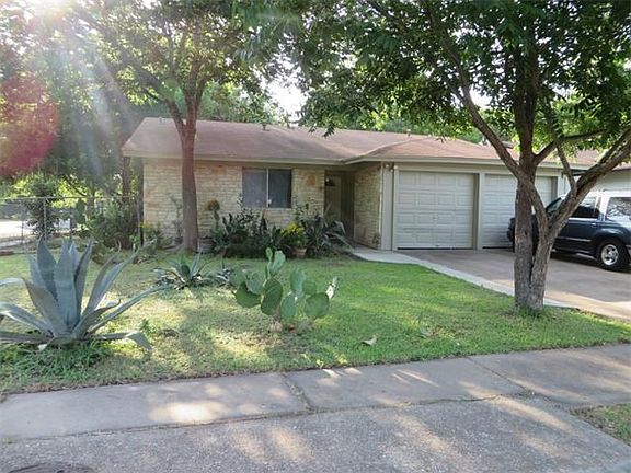 Front of 4 bedroom house, large 2 car garage
