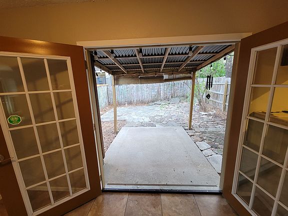 View of backyard through the French doors