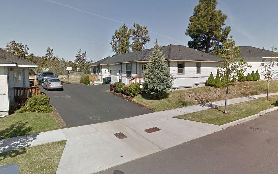 Middle building, unit closest to the road