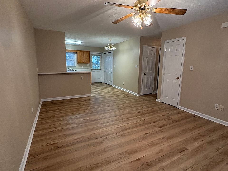 Living room, dining room, kitchen area, new flooring