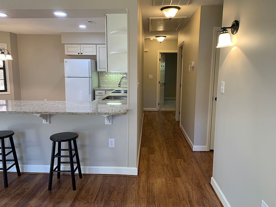Kitchen with hallway to bedrooms and bathrooms