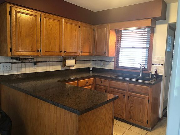 3rd image of 11601 Woodgate Dr NW