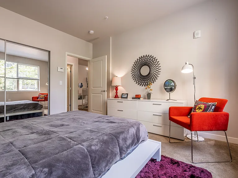 Bedroom with Mirrored Closet Doors
