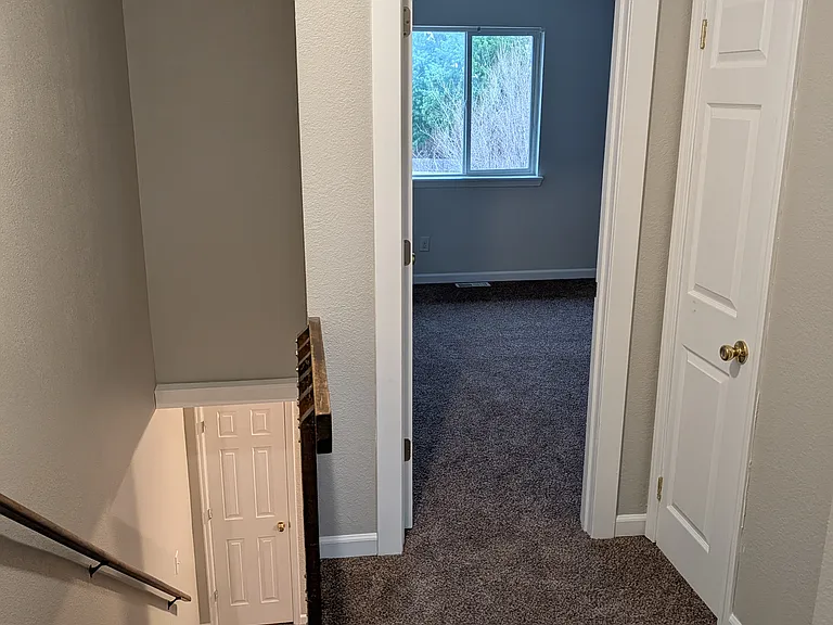 Upstairs linen closet to the right.