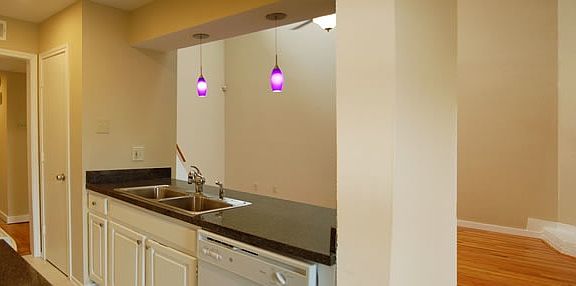 View of kitchen looking towards living room