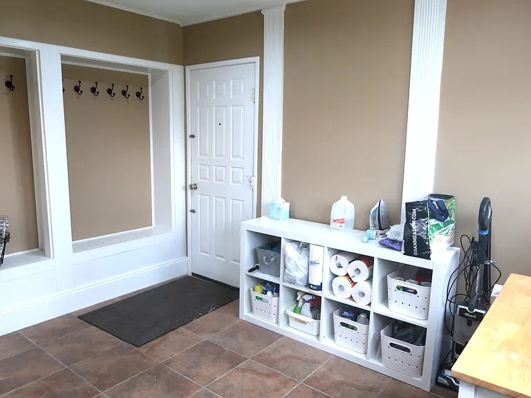 Mud room connected to laundry with cubbies