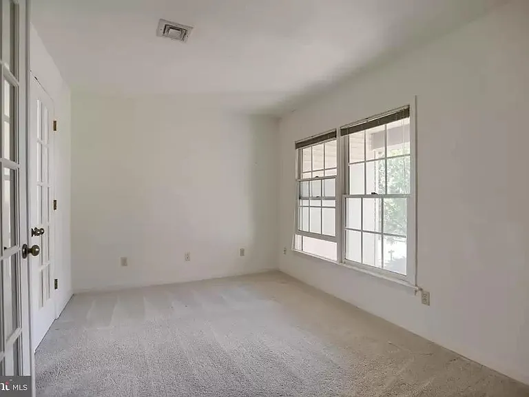 Brightly lit room perfect for an office or a playroom