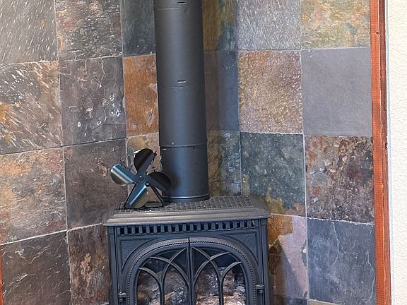 Cozy, gas, thermostat controlled fireplace