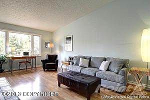 Living room with vaulted ceilings . . .