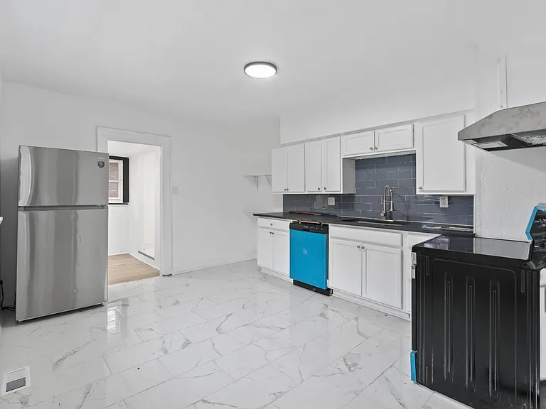 5408 Woodland Ave — Photo 16