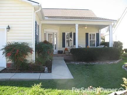 HOME FRONT W/COVERED PORCH : Vinyl Clad; Aluminum Soffit/Facia; Brick Covered Porch