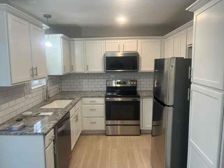Updated kitchen with new Granite Countertops and Stainless Steel appliances!
