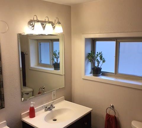 bathroom with double vanity