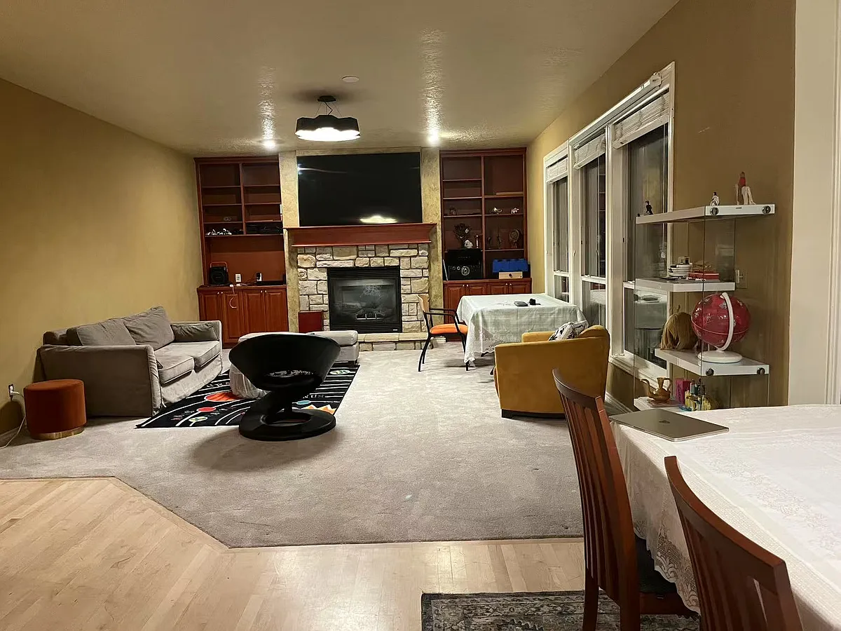 Family room, breakfast nook in foreground - 5445 E Branchwood Ct