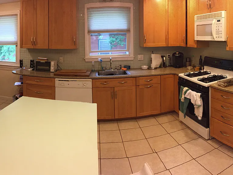 Eat In Kitchen includes granite countertops, gas stove, refrigerator, dishwasher, built in microwave, garbage disposal and pantry.