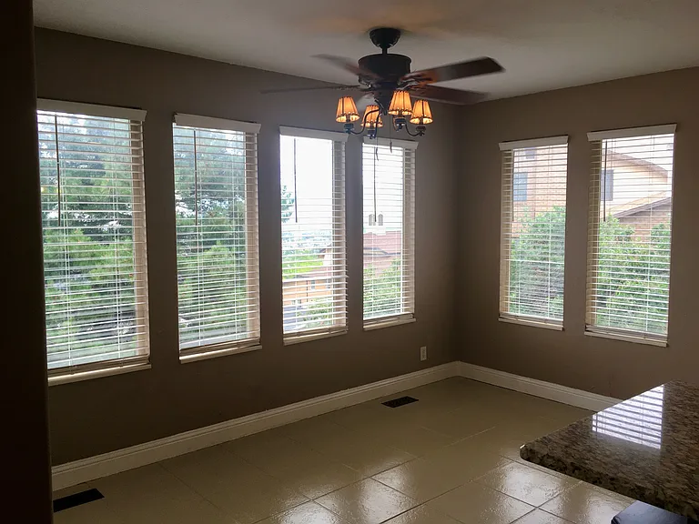 Dining table area with brand new epoxy coated flooring.