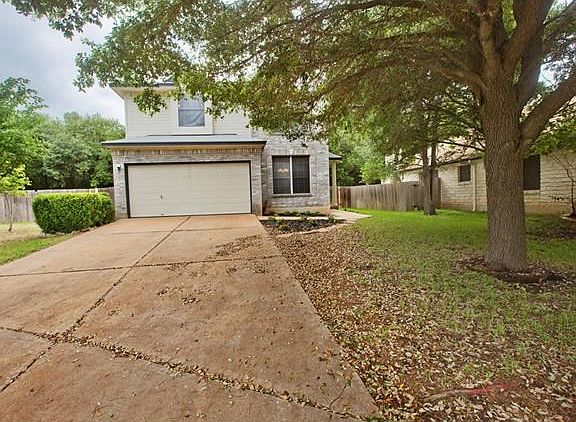 Front view of the home. Wide lot with front yard maintenance