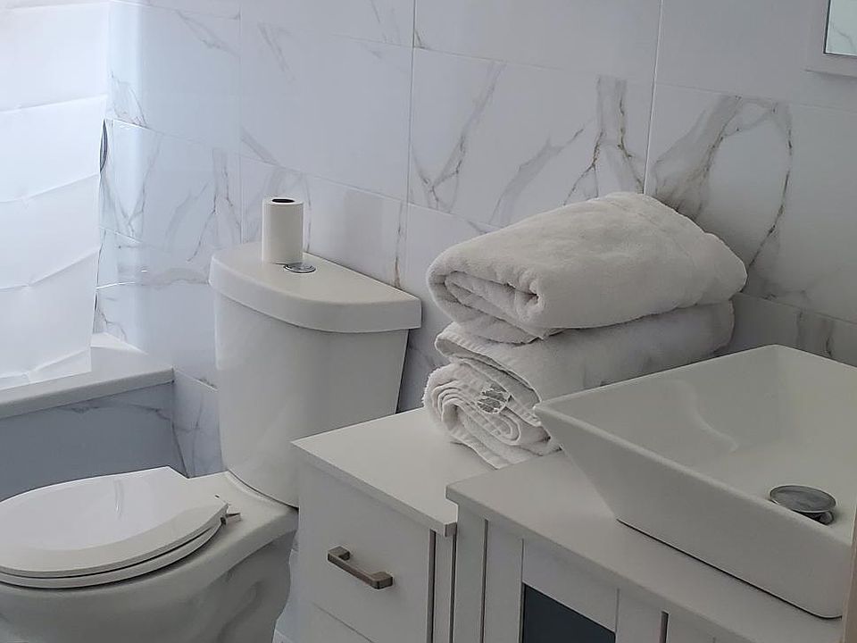 one of two full bathroom