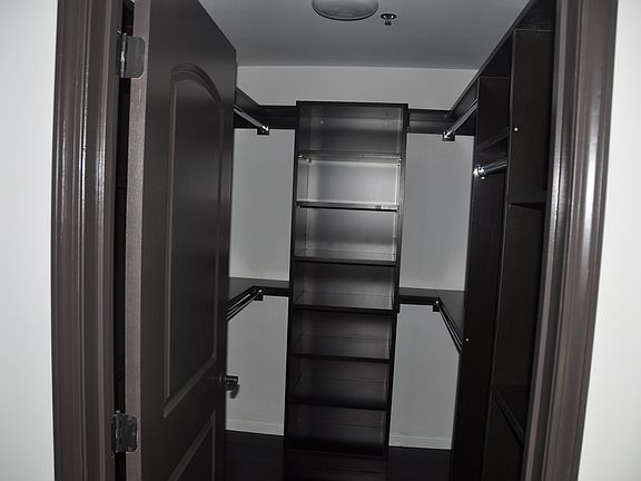 All closets have custom built-in shelves.