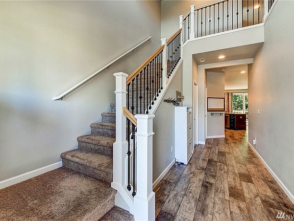 You will love the upgraded flooring! It's in perfect condition as this was a pet free home!