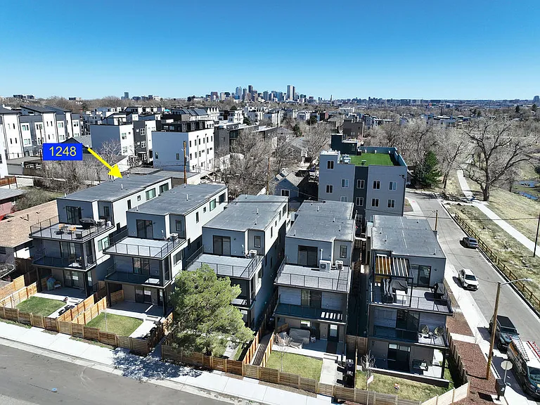 "End unit" with smaller building to the north allowing for backyard privacy