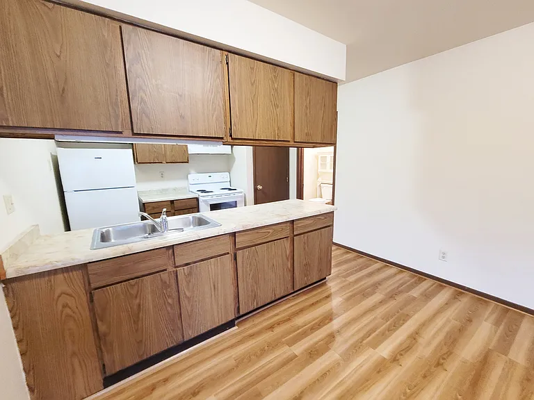 Cabinets open on both sides making storage convenient