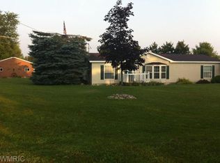 8775 N Wyman Rd, Edmore, MI 48829