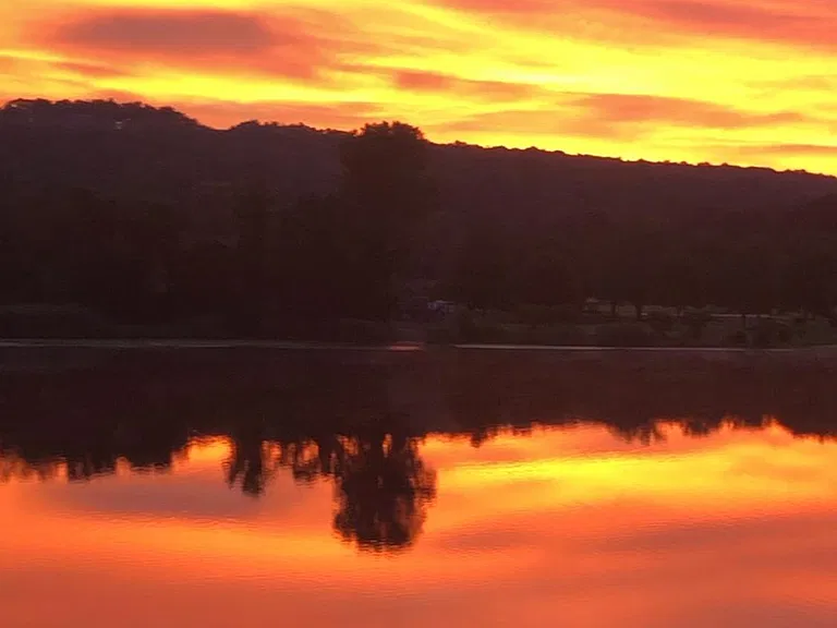 Wake to a lovely, sunrise with lake views.