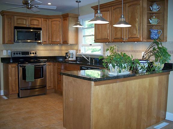 Completely renovated kitchen w/granite counters, stainless steel appliances
