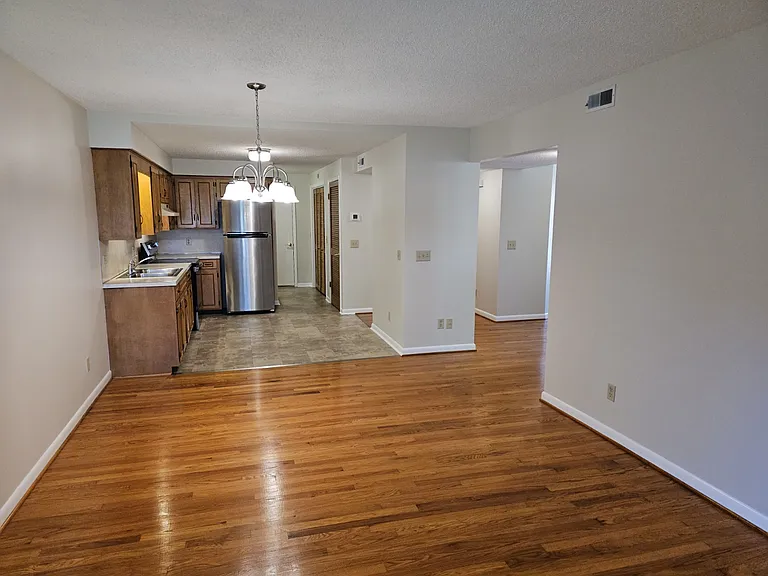 Large living, dining, and kitchen.