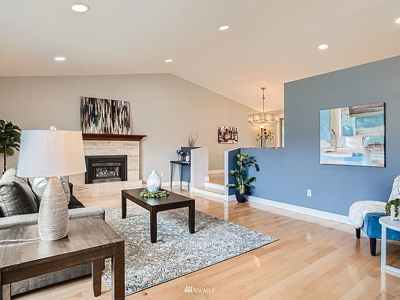 Remodeled lower level, modern chic fire surround, sunken front room with beautiful hardwoods  