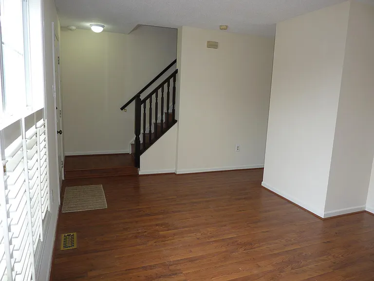 Stairs from 1st floor living room to 2nd floor