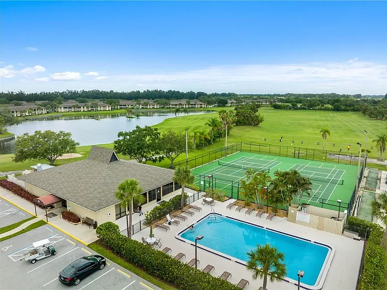 Clubhouse, 1st heated pool, pickleball/tennis courts, driving range + so much more to enjoy!