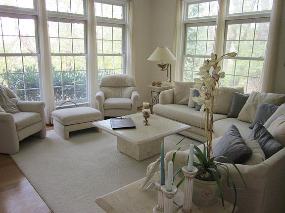 Formal LR w/ wide crown molding and custom windows w/ gorgeous views