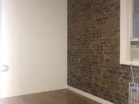 5th image of 523 E 12th St APT 6
