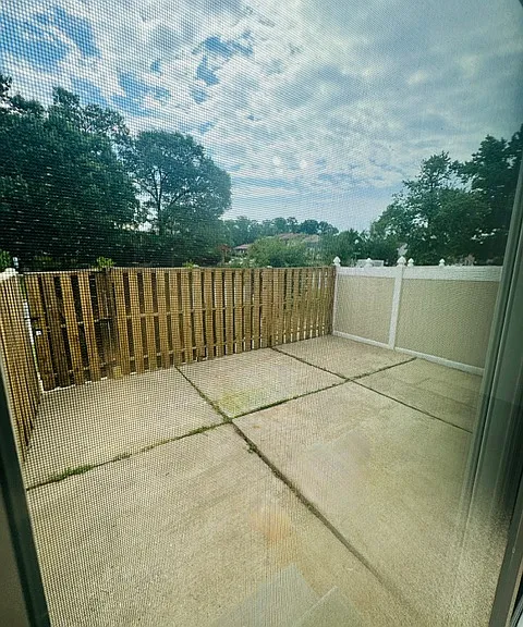 PRIVACY FENCED PATIO OFF THE LIVING ROOM