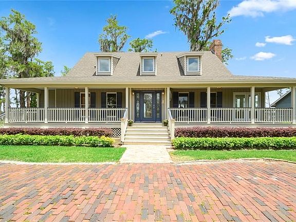 Front porch and brick circular driveway