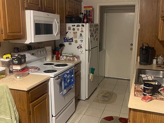 Kitchen leads to utility room & garage