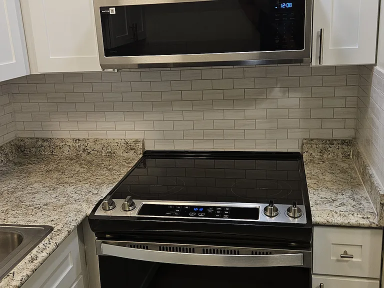 Kitchen new electric range and microwave