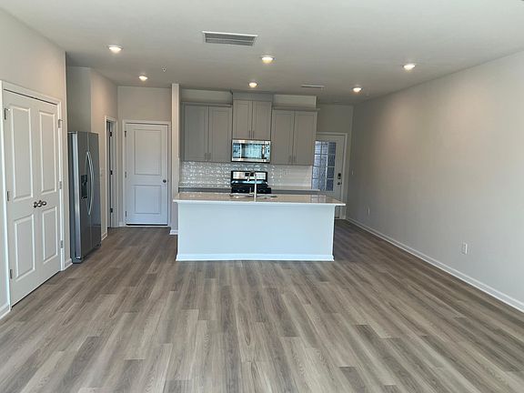 Stainless steel appliances with quartz countertops!