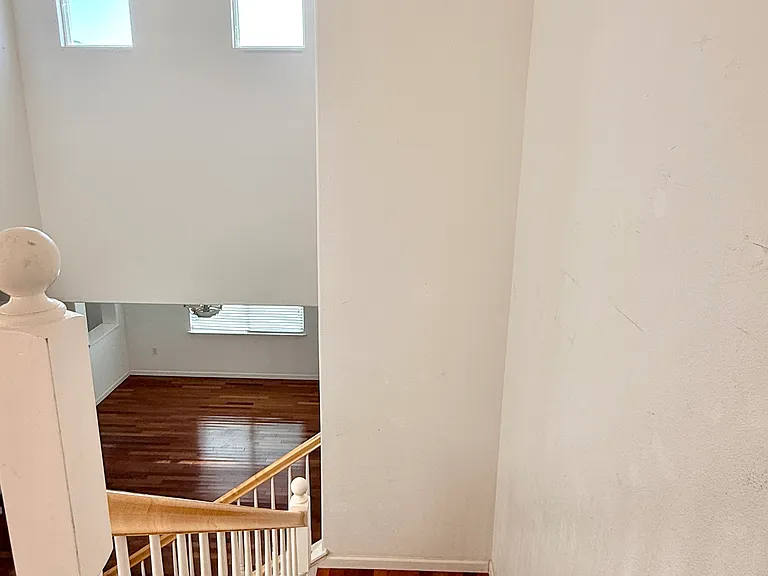 Open staircase leading to the second floor