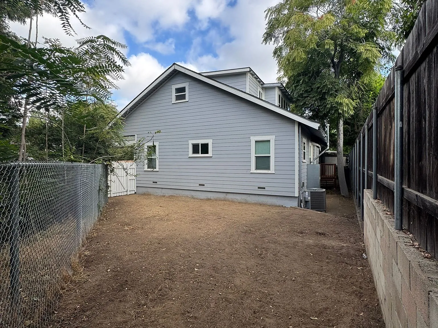Single Family Style Back Home w/ Private Yard & Parking — Photo 3