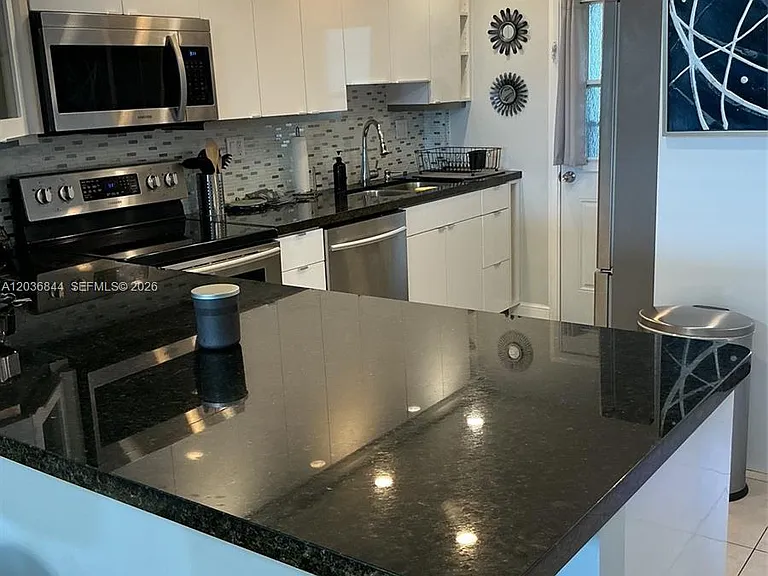 400 Golden Isles Dr #55 — Photo 9